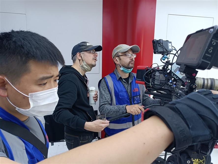 Tianjin production crew coordinating a local shoot